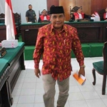 Terdakwa M. Rifai, usai menjalani persidangan dengan agenda eksepsi, Agustus lalu.