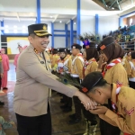 Upacara pembukaan lomba Polisi Cilik (Pocil) yang digelar oleh Polres Madiun di Gor Wilis Kota Madiun, Rabu (18/9/2024). 