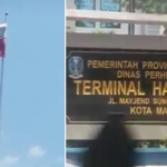 Bendera putih merah yang berkibar di terminal Hamid Rusdi Malang.