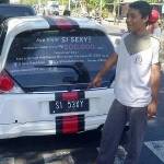 TILANG - Mobil dengan plat nomor S1 53XY ini akhirnya ditilang petugas satlantas Polres Mojokerto. (foto: ahmad gunadhi/BANGSAONLINE)