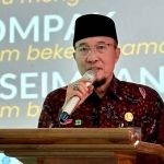 Kepala Kemenag Lamongan saat memberi sambutan.