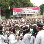 Aksi apel Nusantara Bersatu yang menyerukan gerakan perdamaian dan persatuan di Situbondo.