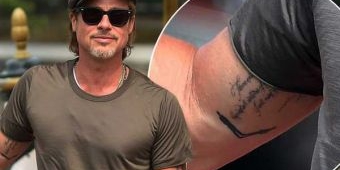 Brad Pitt Pamer Tatto Unik di Lipatan Siku Kanan
