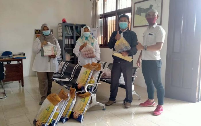 Sinergi OPD Pemkot Kediri Bagikan 126 Paket Sembako dan Masker Untuk Warga Isoman