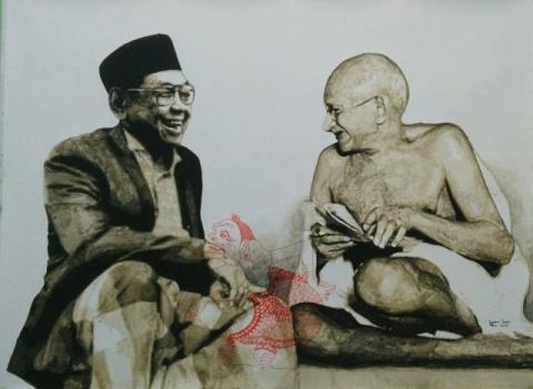 Lukisan Gus Dur mengenakan pakaian santri, sarung dan kopiah bersama Mahatma Gandhi, tokoh India yang dikagumi Gus Dur. Sumber: @mahfudmd