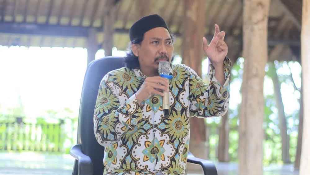 Aguk Irawan MN.