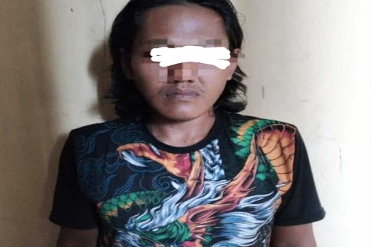 RH (32),  warga Desa Pandangan, Kecamatan Ngantru, saat diamankan pihak kepolisian. Foto: Ist.