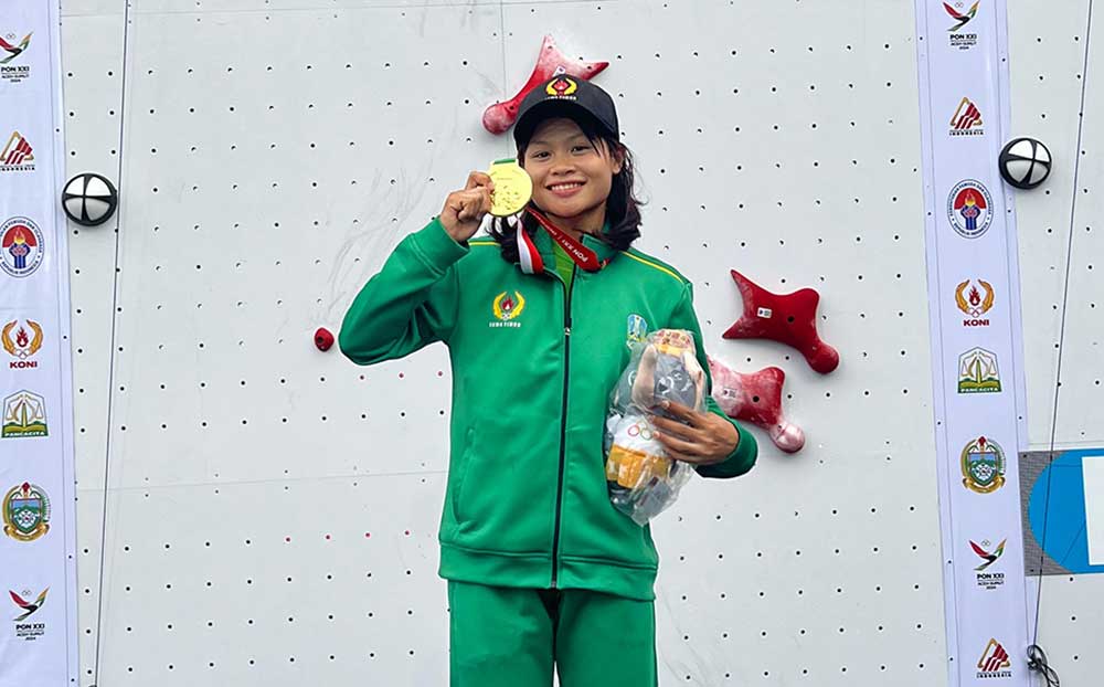 Eka Dian, atlet panjat tebing asal Tuban berhasil menyabet medali emas dalam pertandingan kelas nomor speed WR relay.