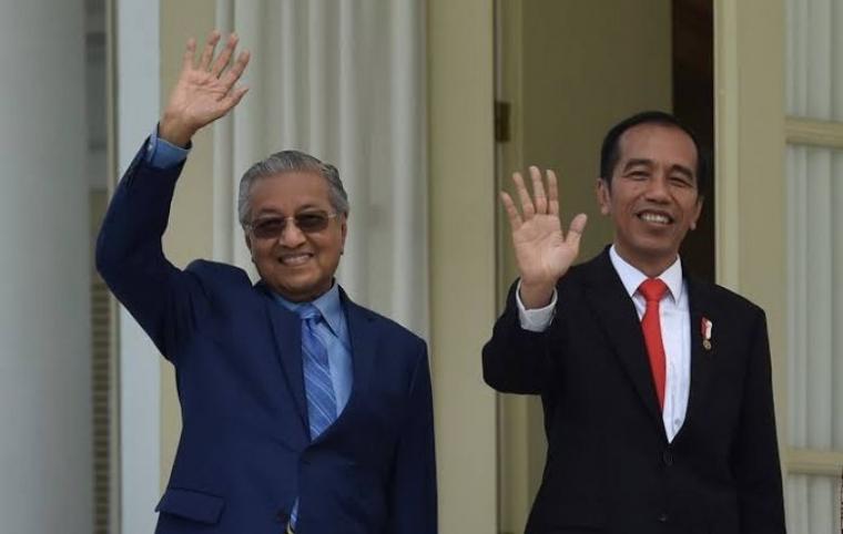 PM Malaysia Mahathir Mohamad (kanan) dan Presiden RI Joko Widodo. foto: medcom.id 