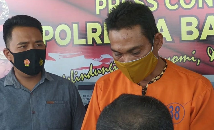 Tersangka M (38). (foto: ist)