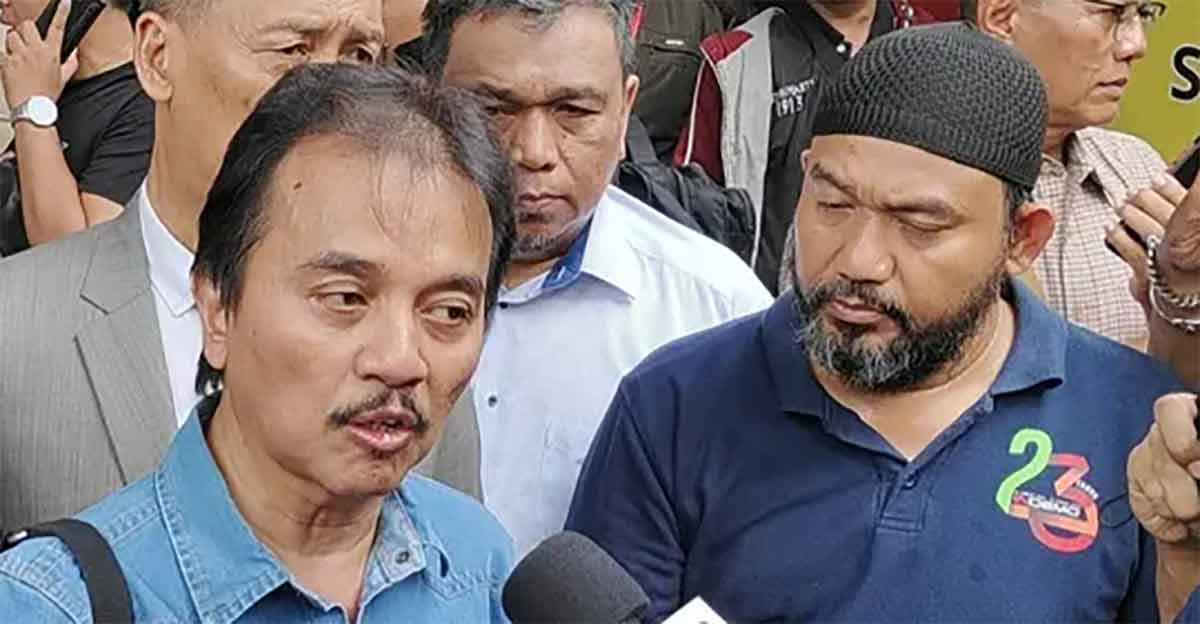 Roy Suryo usai diperiksa di Mapolda Metro Jaya.
