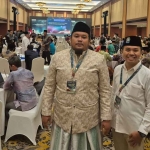 Ketua DPD Hebitren Bangkalan, Abdul Qodir, bersama sekretarisnya, Luthfi Riadi, di ISEF 2025.