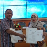 Kepala Kejaksaan Negeri Kota Kediri, Rivo Ch. M. Medellu dan Kepala BPJS Kesehatan Cabang Kediri, Tutus Novita Dewi. (Ist)