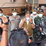 Bupati Fadeli bersama Kapolres AKBP Harun dan Dandim 0812 Letkol Inf. Sidik Wiyono.