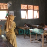 Suasana kegiatan belajar mengajar di SDN 2 Ngrimbi, Kecamatan Bareng, Kabupaten Jombang. Foto: AAN AMRULLOH/ BANGSAONLINE