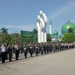 Apel gelar pasukan dalam rangka operasi penegakan disiplin protokol kesehatan Covid-19 di area Arek Lancor Kabupaten Pamekasan, Minggu (31/01/21) pagi.