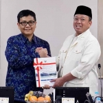 Menteri ATR/BPN saat menerima laporan hasil pemeriksaan BPK. 