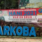 Banner Peringatan Hari Anti Narkotika Internasional. (foto: ist)