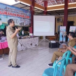 Sosialisasi E-Sambat dan SP4N Lapor yang berlangsung di Kelurahan Bugul Lor, Kecamatan Panggungrejo, Kota Pasuruan.