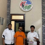 Tersangka saat diamankan di Mapolres Pasuruan.