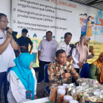 Menteri Kependudukan dan Pembangunan Keluarga, Dr. Wihaji di kegiatan Grebek Pasar