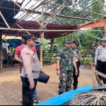 Kasat Reskrim Polres Pasuruan AKP Adimas Firmansyah saat memimpin penggrebekan