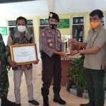 Desa Prodo Kecamatan Winongan mendapat penghargaan dari Pemprov Jatim dengan masuk kategori desa tangguh bencana predikat madya. (foto: ist).