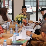 Plt Wali Kota Pasuruan saat menghadiri diskusi terkait pemanfaatan QRIS.