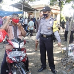 Operasi Yustisi Protokol Kesehatan di Pasar Legi Ngawi. (foto: ist)