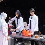 Makan bersama gratis yang digelar oleh Polresta Malang Kota dalam rangka memperingati Hari Bhayangkara
