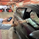 Ilustrasi pembayaran parkir nontunai. Foto: Hms