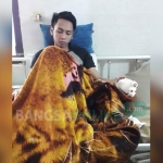 Novi Fransiska A pasca menjalani operasi di RS Lavalette Malang.  Kini ia menunggu keadilan dari pihak berwajib. foto: IST/ BANGSAONLINE