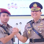 AKBP Herdiawan Arifianto saat bersama AKBP Daniel S. Marunduri.