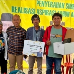 Anggota Komisi IV DPR RI dari Fraksi Golkar, Eko Wahyudi, saat melaksanakan penyerahan simbolis realisasi aspirasi TA 2025.