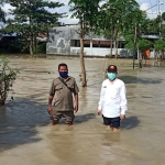 Banjir luapan Kali Lamong akhir Mei 2020 yang merendam sejumlah wilayah di Gresik Selatan. foto: SYUHUD/ BANGSAONLINE