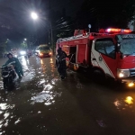 Penanganan banjir di Surabaya (dok. Kominfo)