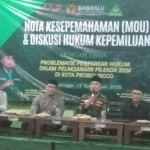 Kegiatan penandatanganan MoU dan diskusi hukum kepemiluan yang digelar di aula kantor PCNU Probolinggo. 