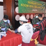 Kegiatan vaksinasi hasil kerja sama antara Kodim 0818/Malang-Batu dengan Dinas Kesehatan Kota Batu.