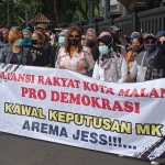 Aliansi Rakyat Kota Malang Pro-Demokrasi saat menggelar aksi damai.