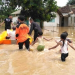 Kondisi banjir yang menggenangi rumah warga.