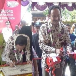 Bupati Ponorogo Ipong Muchlissoni menandatangani prasasti dan memotong pita peresmian Pasar Balong.