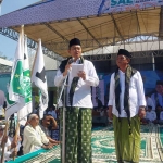 Achmad Amir Aslichin dan Edy Widodo saat menghadiri istighotsah dan deklarasi di parkir timur GOR Delta Sidoarjo, Sabtu (21/9/2024).