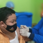 Salah satu siswa SMPN 13 Kota Madiun saat disuntik vaksin.