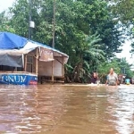 Suasana banjir yang melanda Jombang.