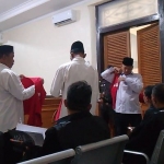 Keempat terdakwa (baju putih) saat menjalani persidangan