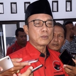 Ir. Budi 