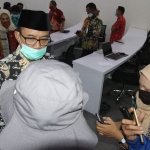 Bupati Ngawi Ir. Budi Sulistyono memberikan keterangan kepada wartawan usai mengikuti Musrenbangnas melalui teleconference.