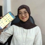 Salah satu peserta saat menunjukkan Mobile JKN.