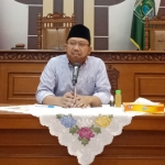 H. M. Sudiono Fauzan, Sekretaris DPC PKB Pasuruan saat memberikan penjelasan terkait acara halal bihalal yang disorot netizen.