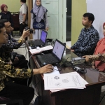 Kantor Imigrasi Kelas I TPI Malang mengadakan layanan Pandangi Karmila di Kantor Inspektorat Kota Malang, Jumat (26/05).